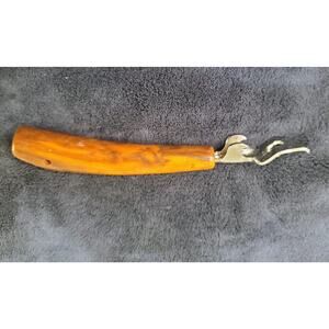 Vintage Manual Bottle & Can Opener with Butterscotch Hue Bakelite Handle